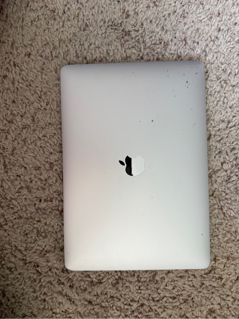 Apple Silver MacBook Top-View with Apple Logo